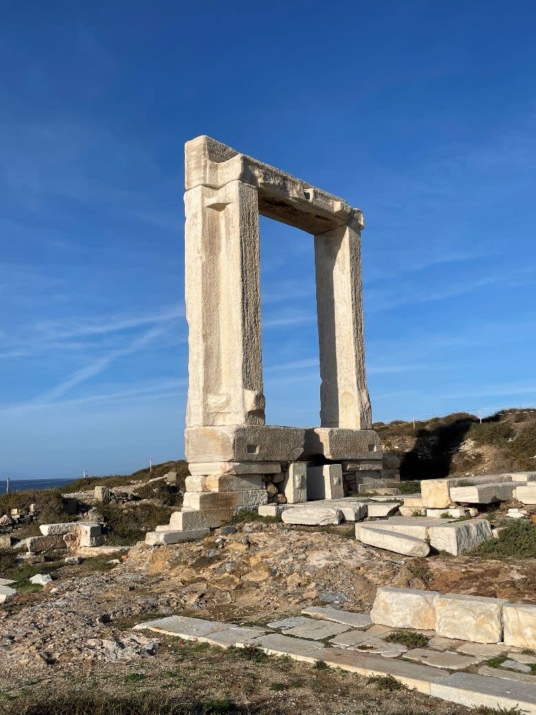 Ancient marble gateway by the sea
